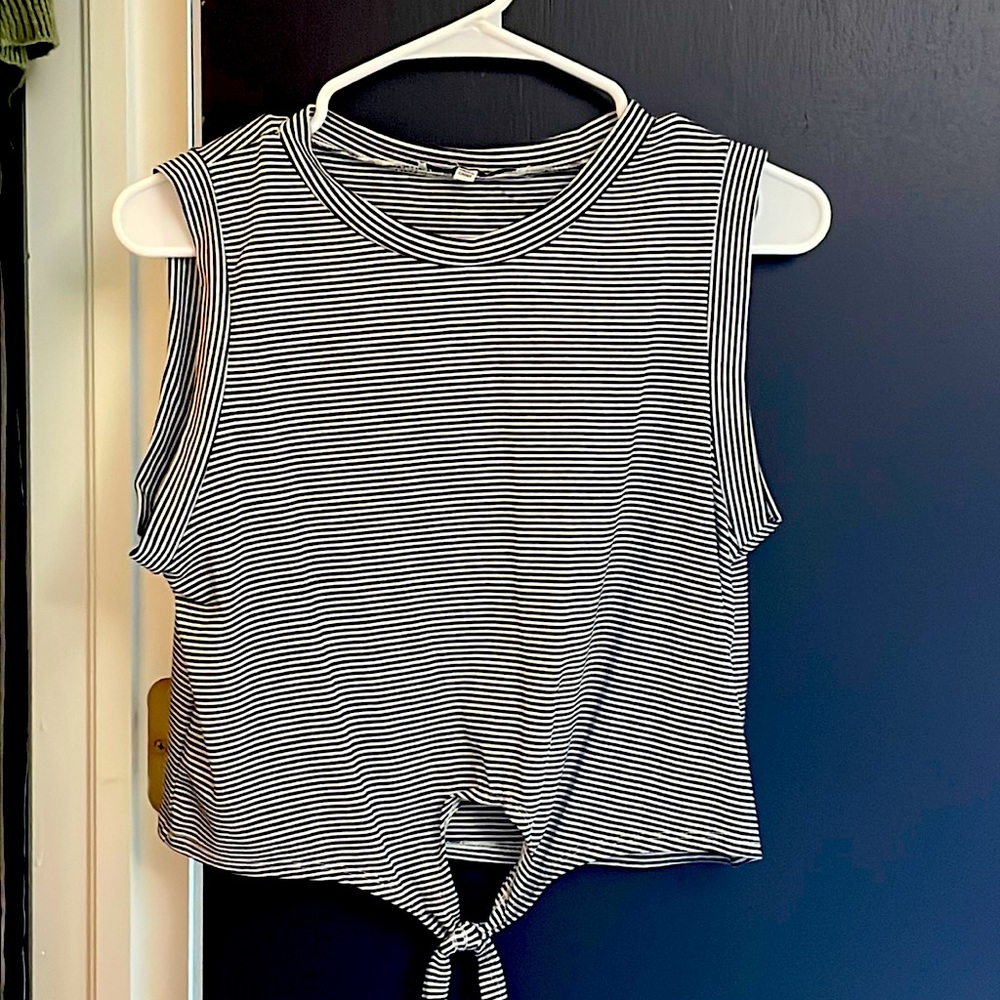 Comfortable black&white striped shirt. Only worn once and cute for the summer.